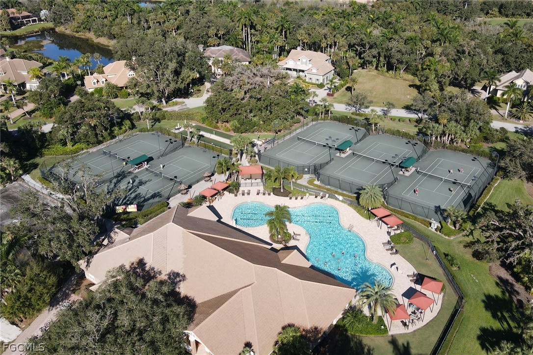 13020 Pebblebrook Point Circle, Unit 202 Fort Myers, FL 33905 - Photo 39 of 40 an aerial view of residential houses with outdoor space