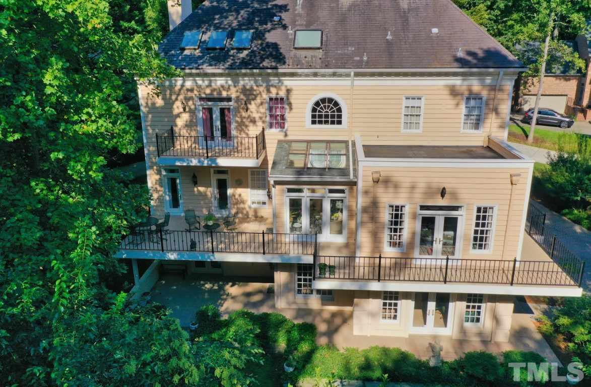1112 Hymettus Court Raleigh, NC 27607 - Photo 2 of 29 a view of a building with balcony and windows