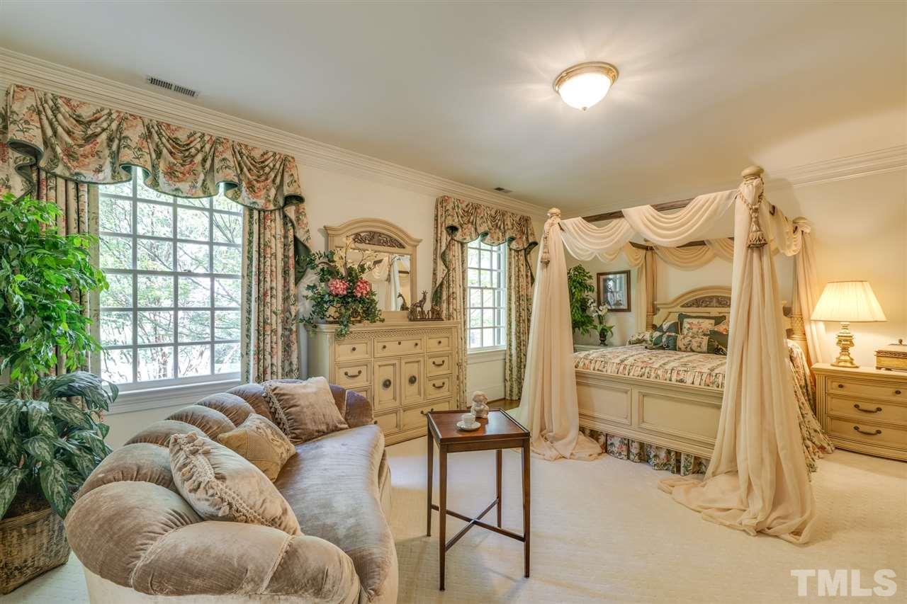1112 Hymettus Court Raleigh, NC 27607 - Photo 15 of 29 a living room with furniture and a large window