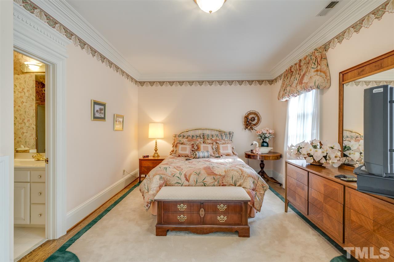 1112 Hymettus Court Raleigh, NC 27607 - Photo 17 of 29 a bedroom with bed and window