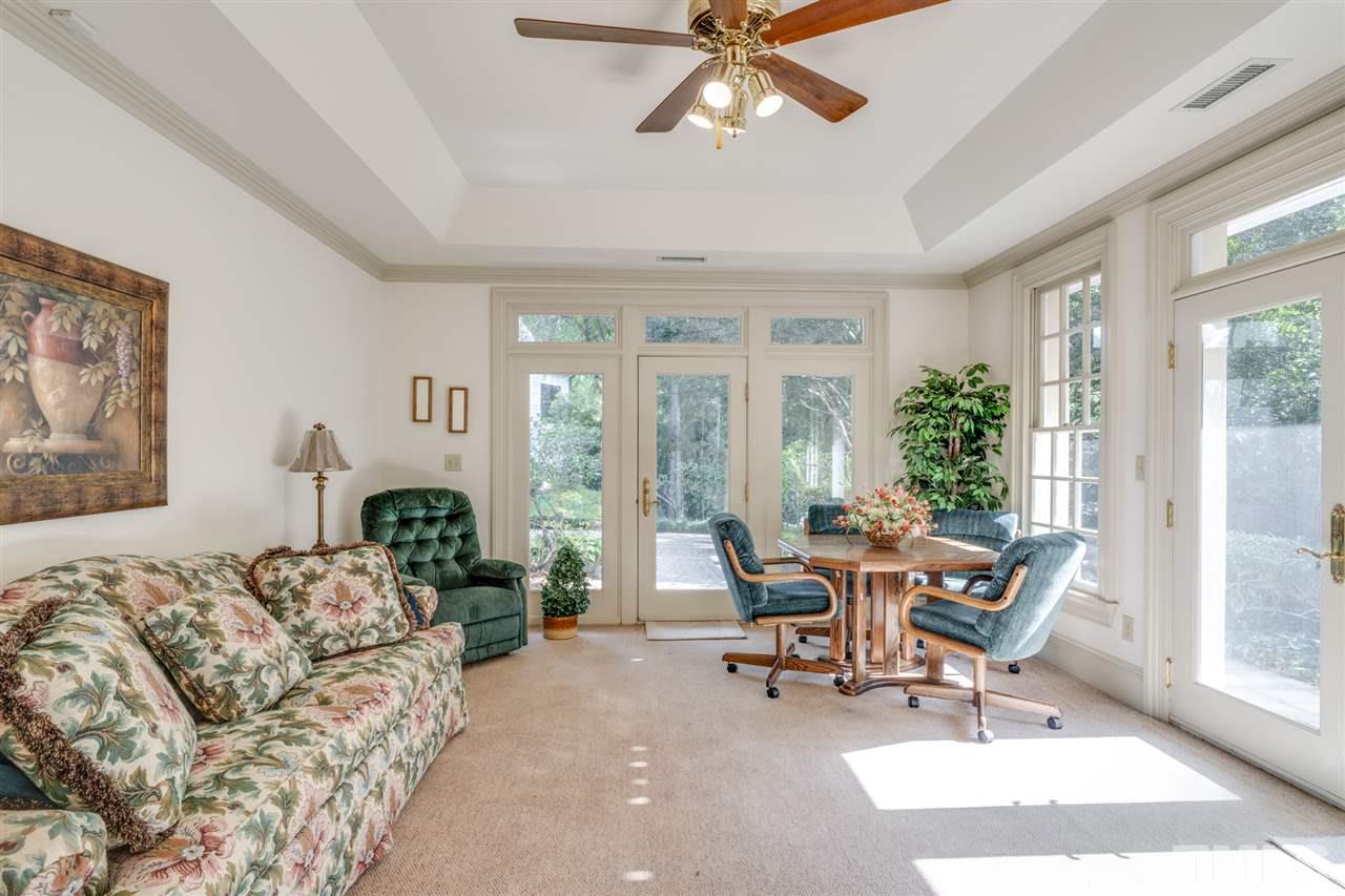 1112 Hymettus Court Raleigh, NC 27607 - Photo 20 of 29 a living room with furniture and a large window