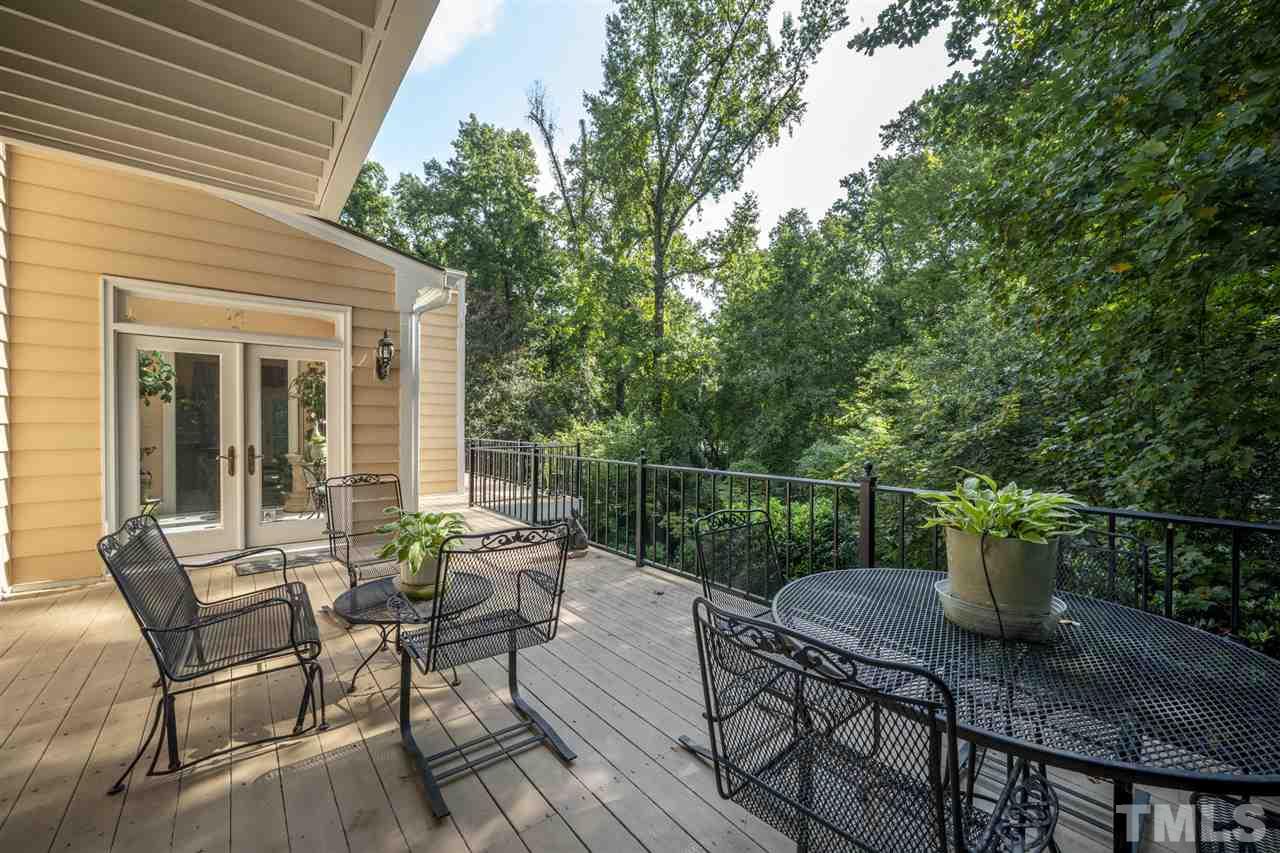 1112 Hymettus Court Raleigh, NC 27607 - Photo 23 of 29 a view of backyard with furniture and potted plants