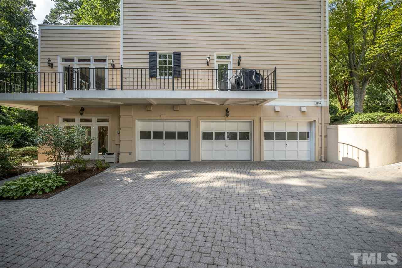 1112 Hymettus Court Raleigh, NC 27607 - Photo 25 of 29 a view of a building with a window and a yard