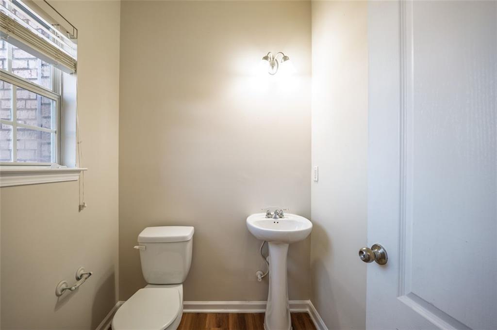 3017 Bellingham Way Lithia Springs, GA 30122 - Photo 13 of 44 a bathroom with a sink and a toilet