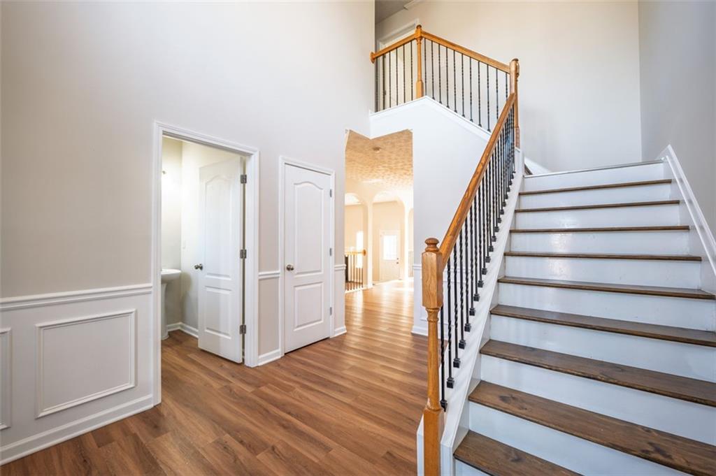 3017 Bellingham Way Lithia Springs, GA 30122 - Photo 14 of 44 a view of entryway with wooden floor and stairs