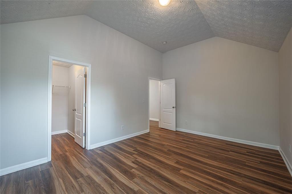 3017 Bellingham Way Lithia Springs, GA 30122 - Photo 25 of 44 a view of room with wooden floor