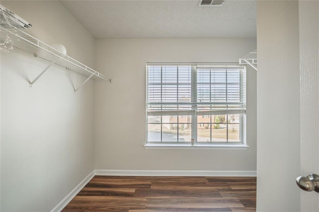 3017 Bellingham Way Lithia Springs, GA 30122 - Photo 30 of 44 a view of a room with racks on the wall