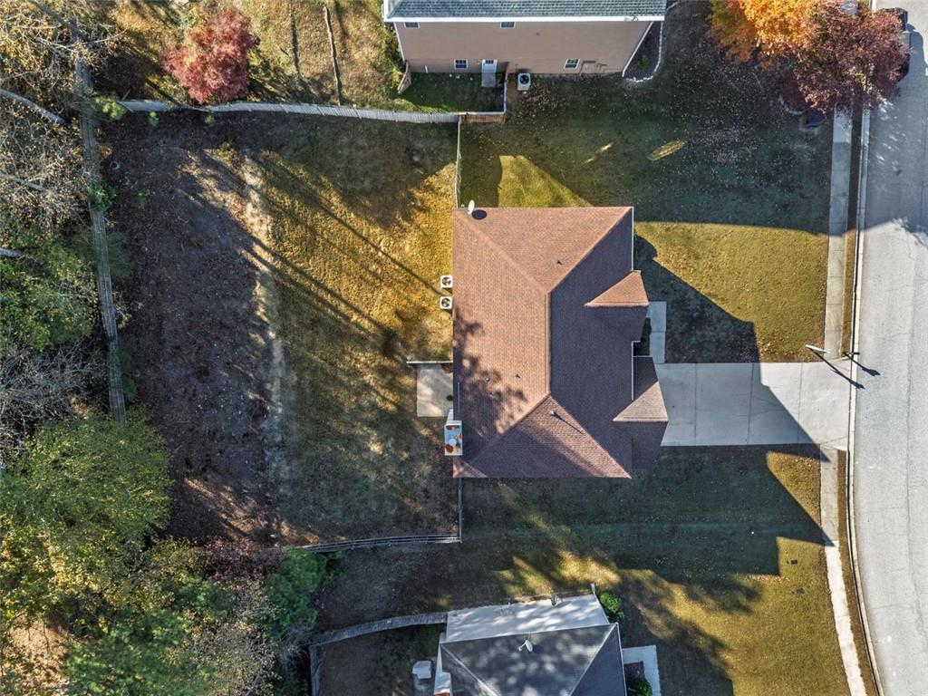 3017 Bellingham Way Lithia Springs, GA 30122 - Photo 42 of 44 an aerial view of house with yard