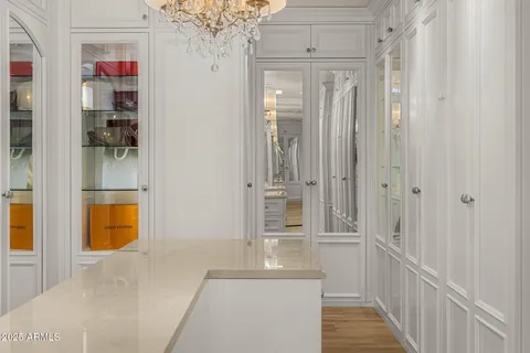 a bathroom with a sink double vanity and mirror