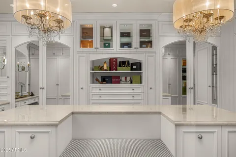 a bathroom with a shower curtain and a sink