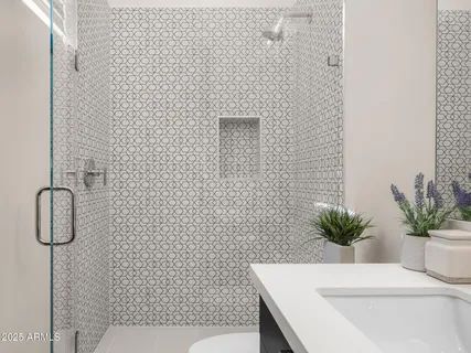 a view of a dining room with furniture a chandelier and wooden floor