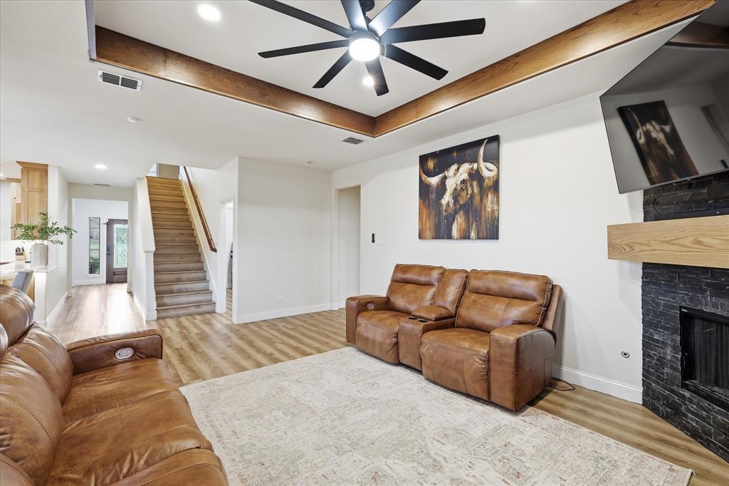 430 Ridgecrest Place Sanger, TX 76266 - Photo 8 of 40 Living area featuring wood-finish flooring, a contemporary ceiling fan, and recessed lighting