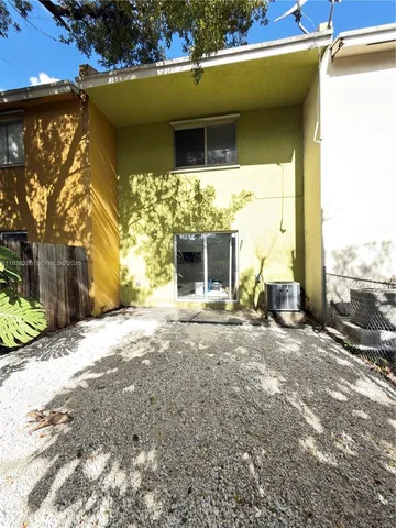 a view of a house with a patio