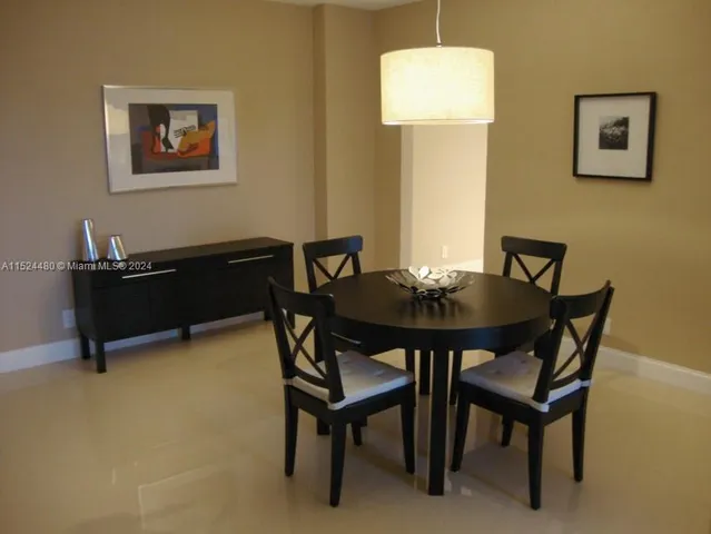 a view of a workspace with furniture