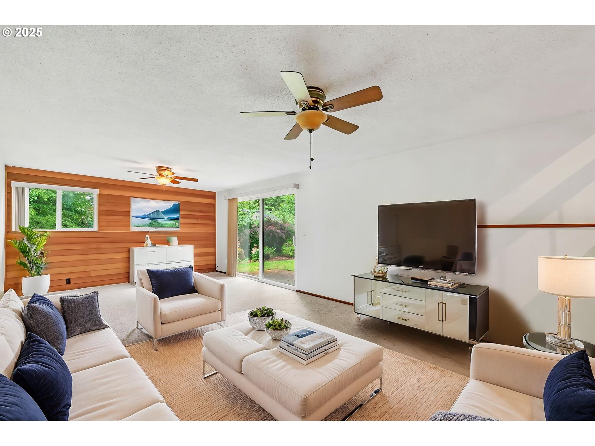 2811 Greentree Way Eugene, OR 97405 - Photo 15 of 38 a living room with furniture and a flat screen tv
