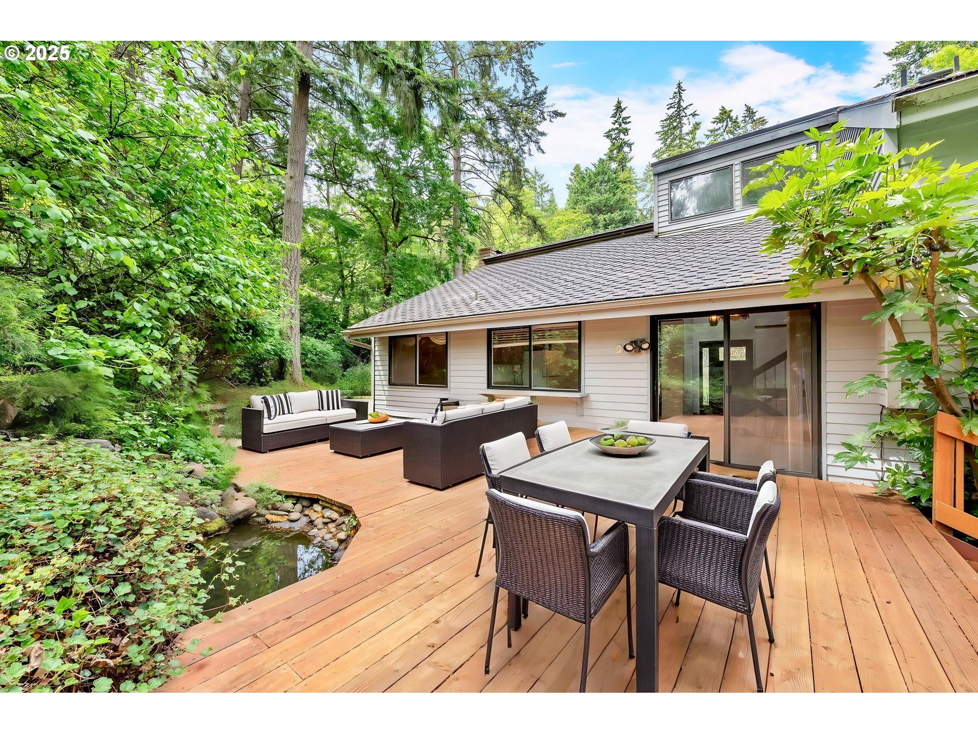 2811 Greentree Way Eugene, OR 97405 - Photo 32 of 38 a view of a patio with a table and chairs