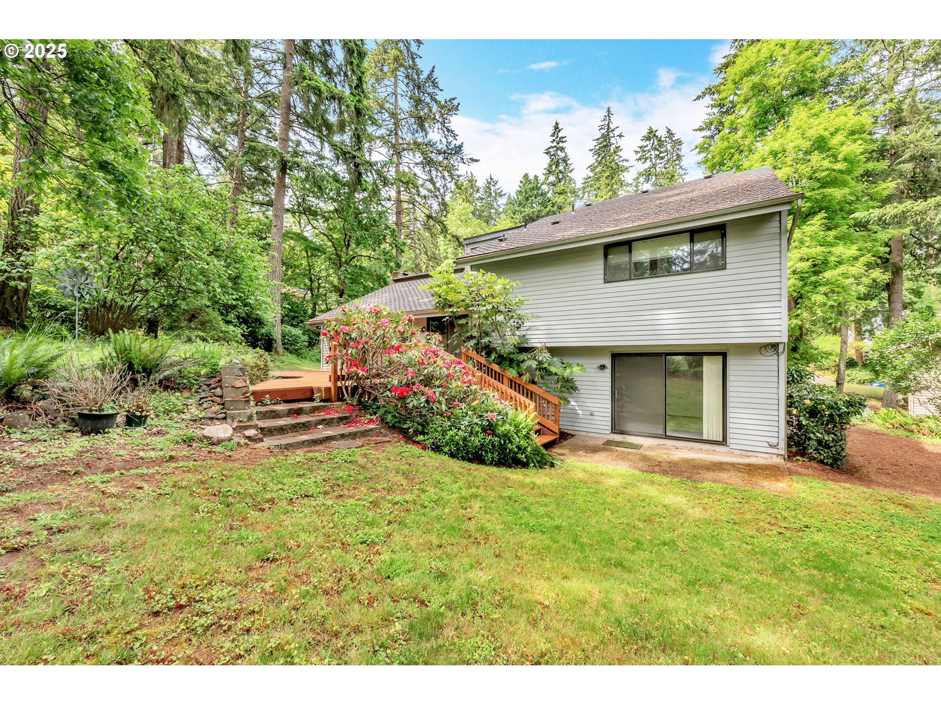 2811 Greentree Way Eugene, OR 97405 - Photo 34 of 38 a view of a house with a yard and garage