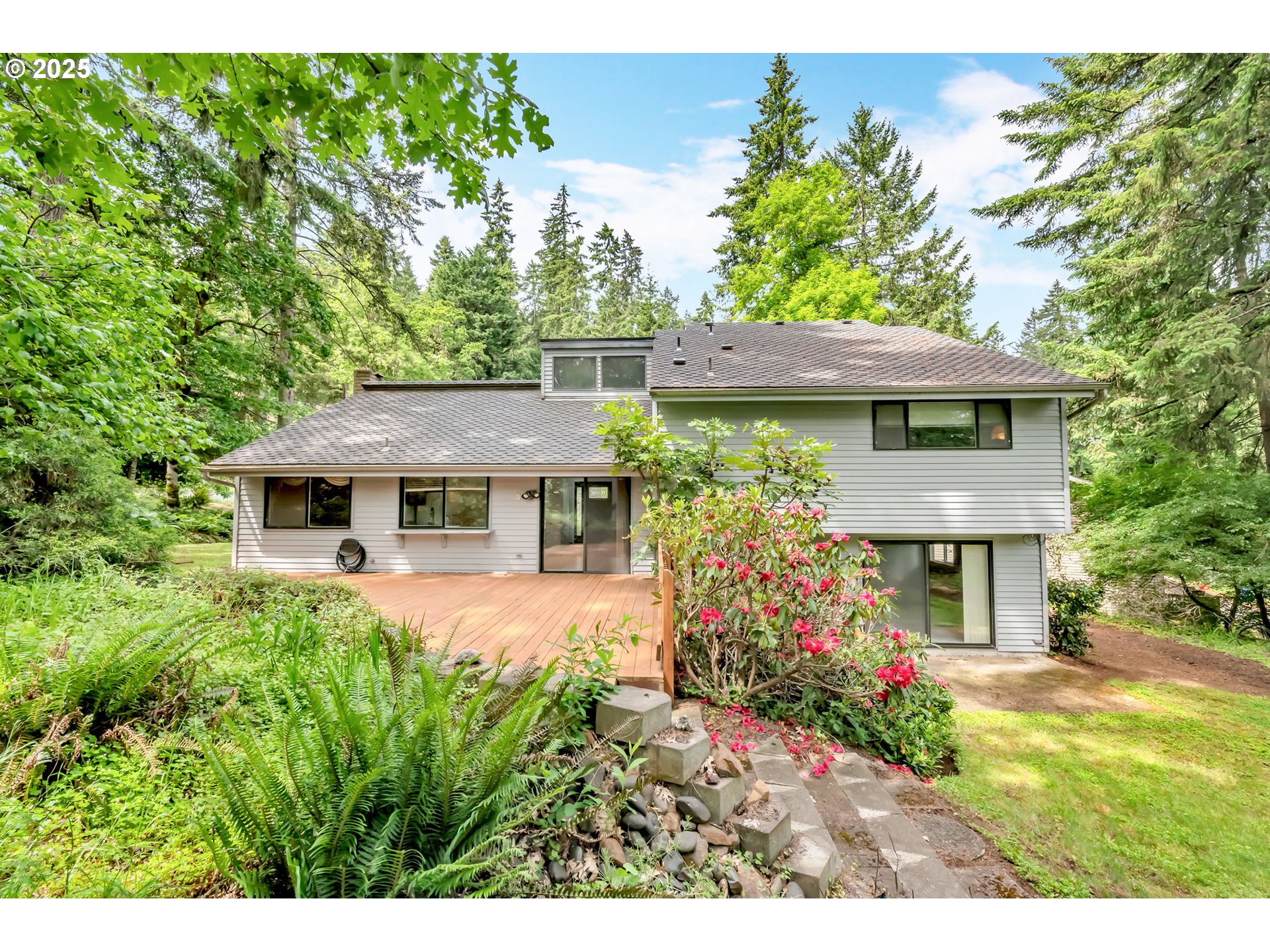 2811 Greentree Way Eugene, OR 97405 - Photo 36 of 38 a front view of a house with a yard