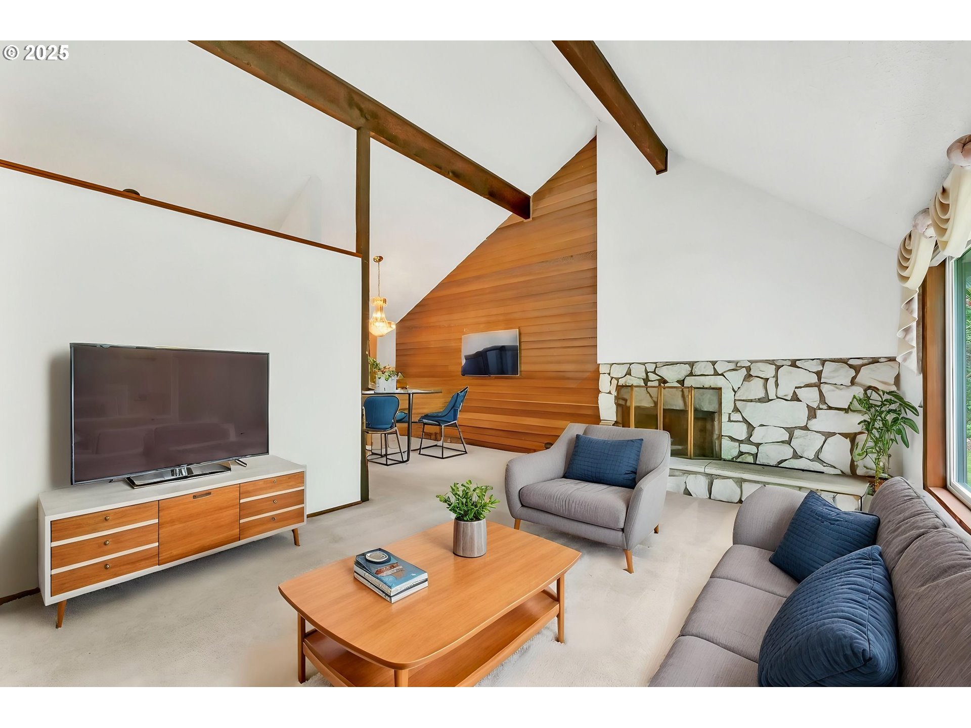 2811 Greentree Way Eugene, OR 97405 - Photo 6 of 38 a living room with furniture and a flat screen tv