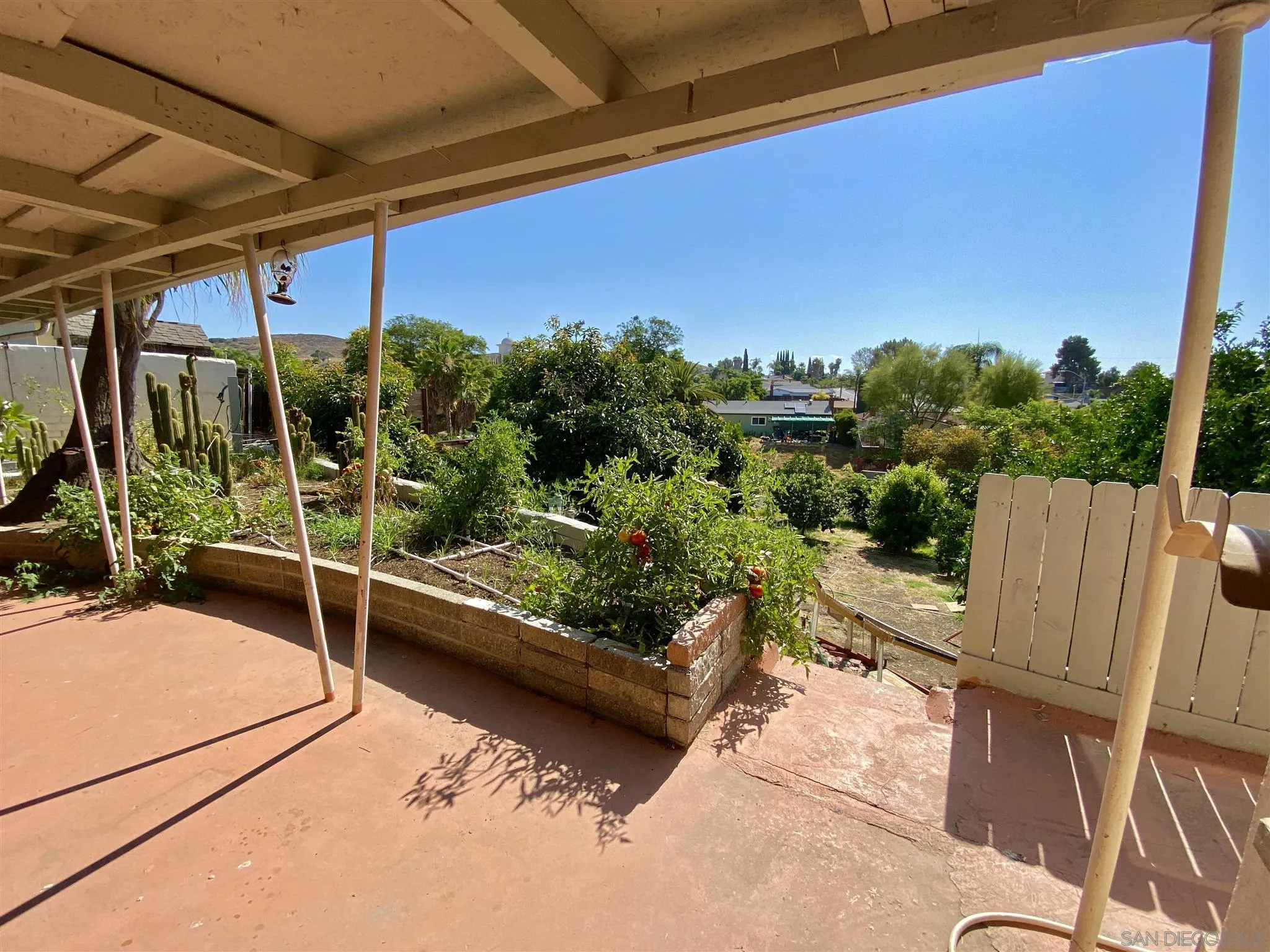 9609 Vomac Road Santee, CA 92071 - Photo 5 of 10 a view of a two chairs in the patio