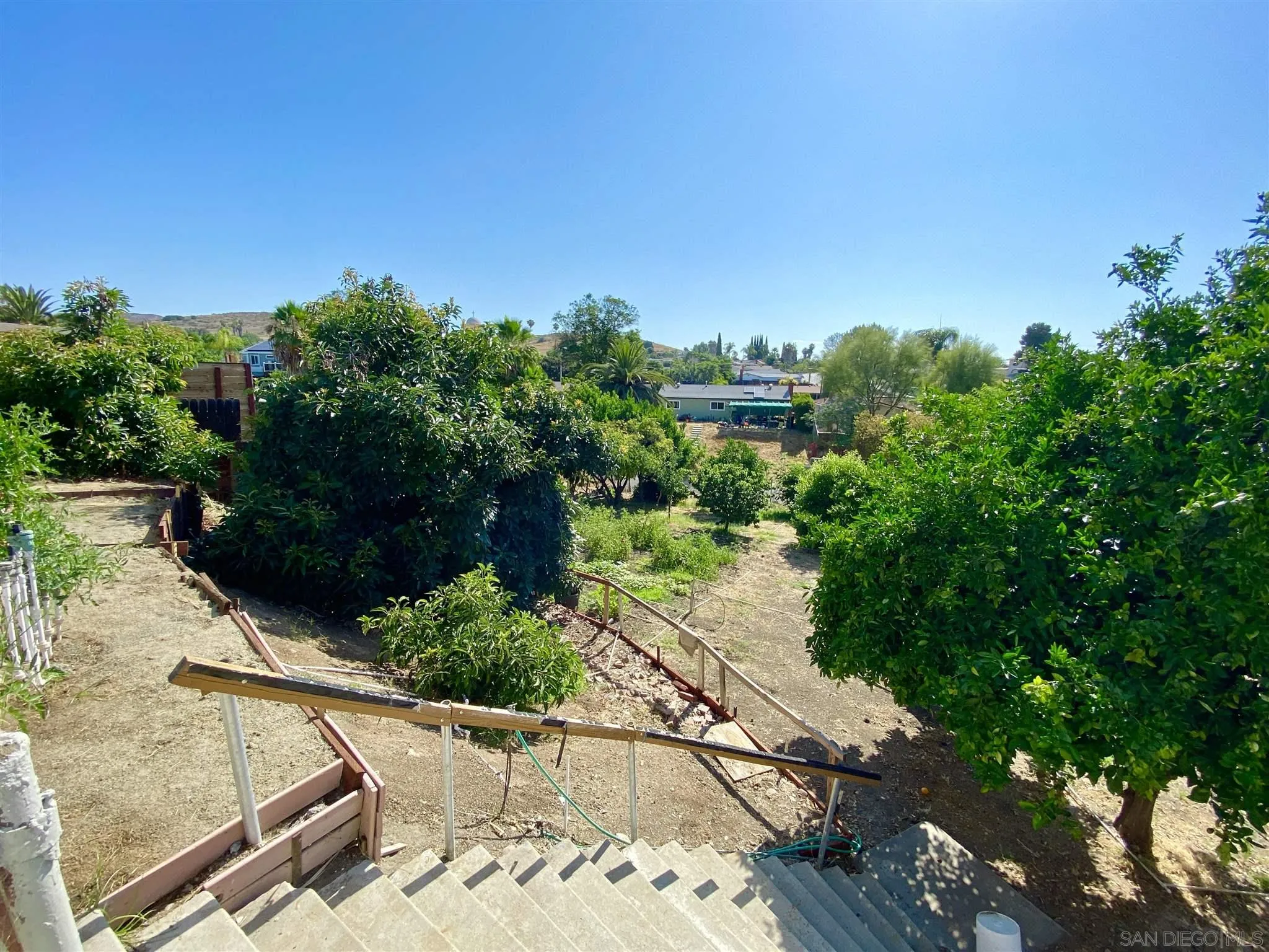 9609 Vomac Road Santee, CA 92071 - Photo 6 of 10 a view of an outdoor space and a yard