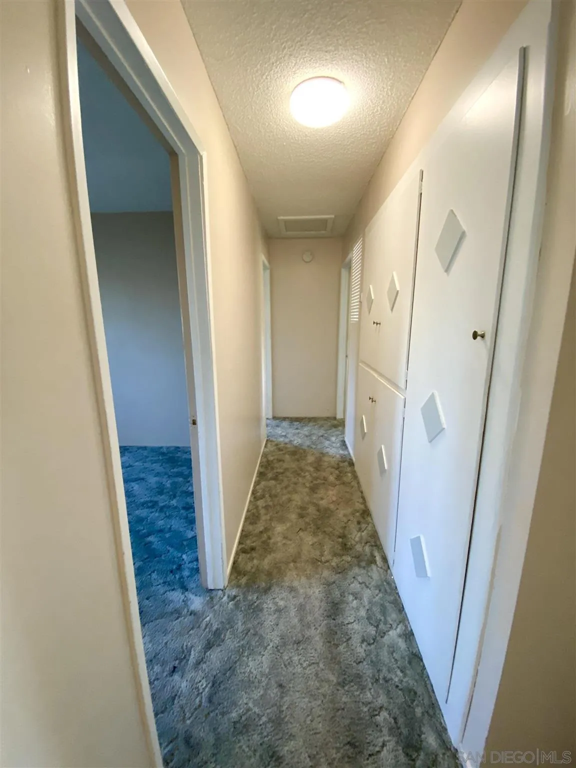 9609 Vomac Road Santee, CA 92071 - Photo 9 of 10 view of a hallway