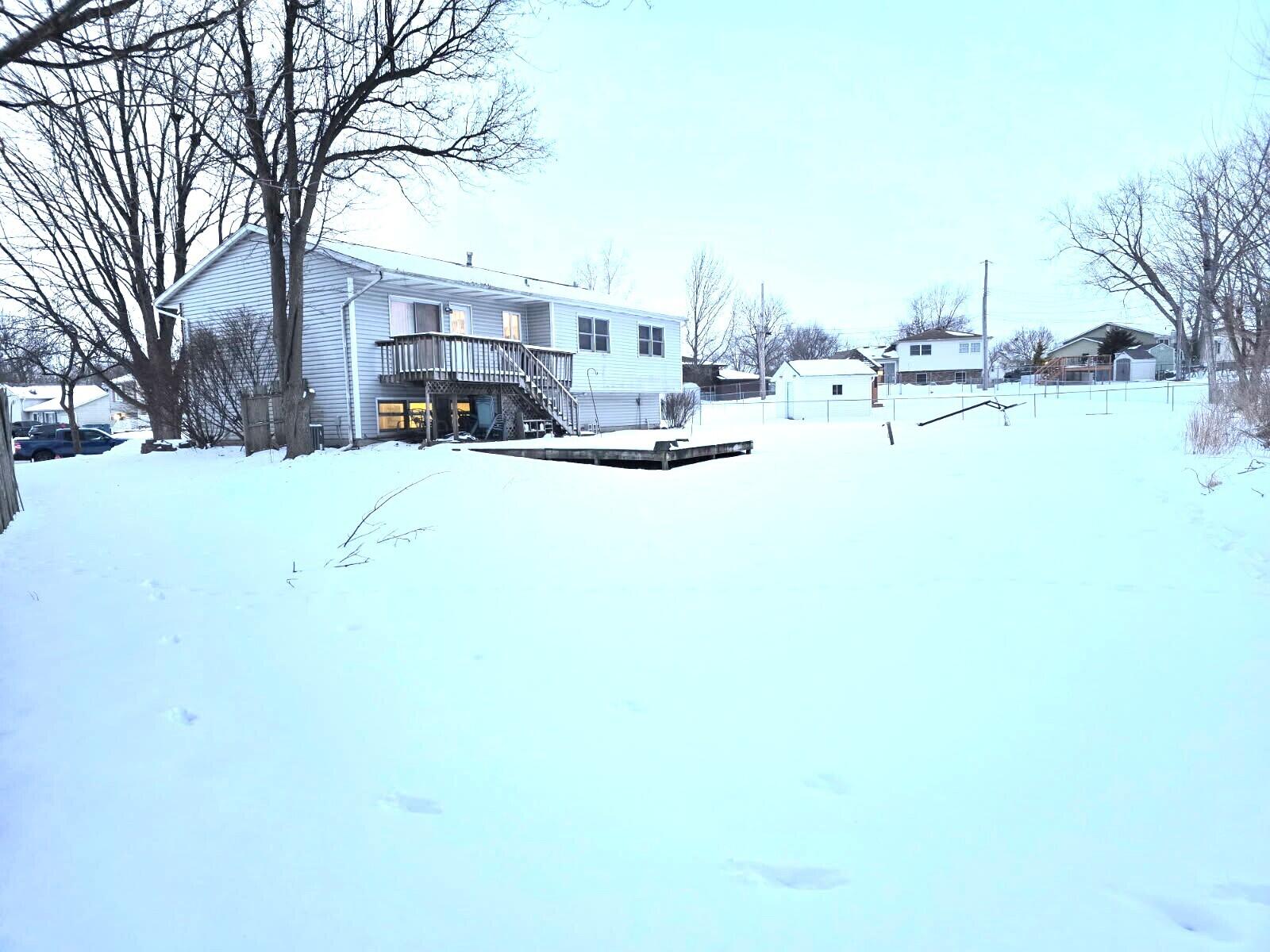 79 Maple Court Hebron, IN 46341 - Photo 18 of 19 a street view with residential house