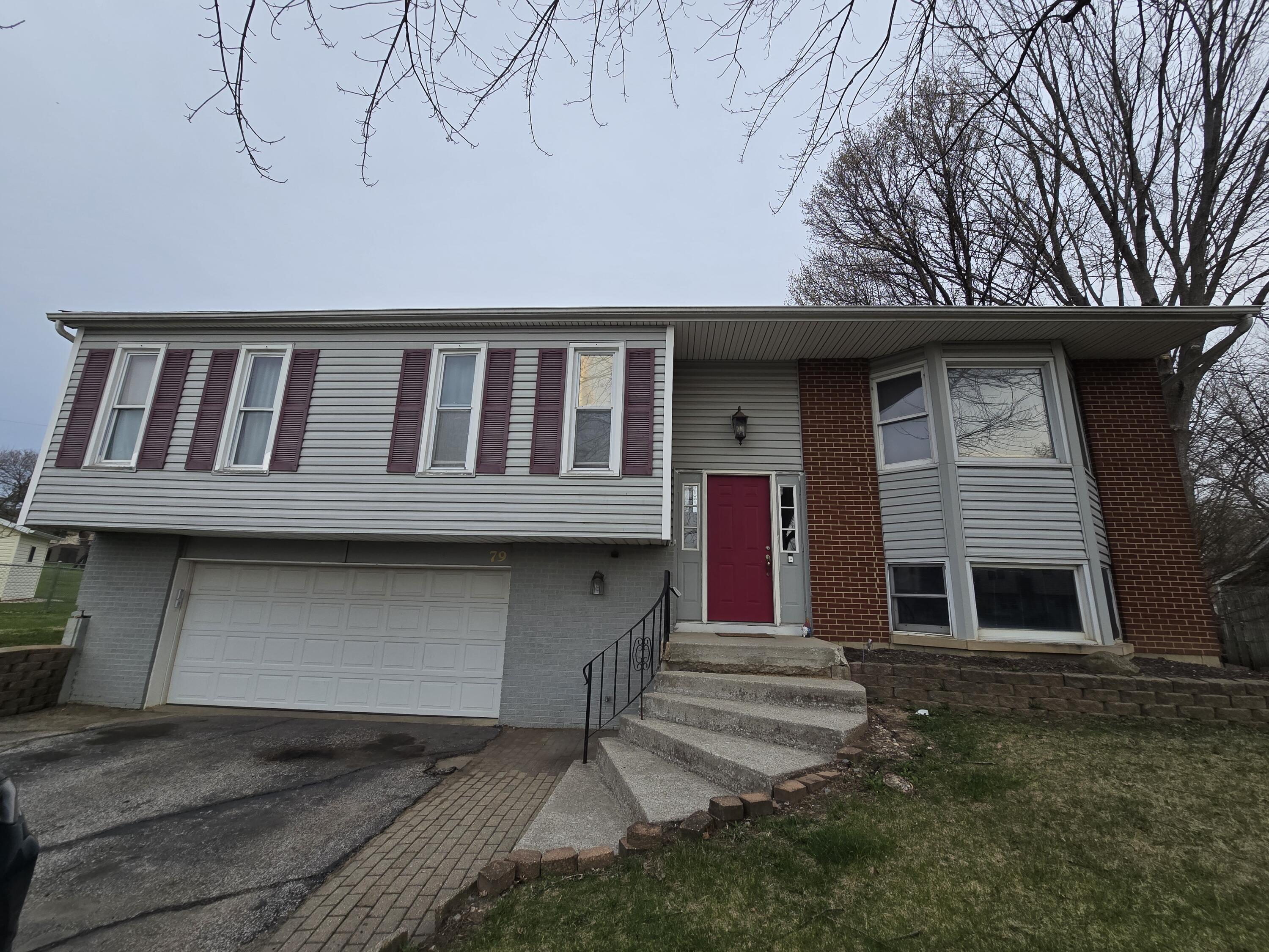 79 Maple Court Hebron, IN 46341 - Photo 22 of 22 a front view of a house