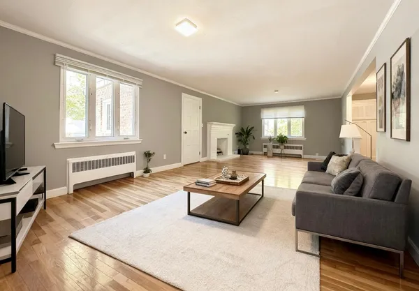 a bedroom with bed and a couch