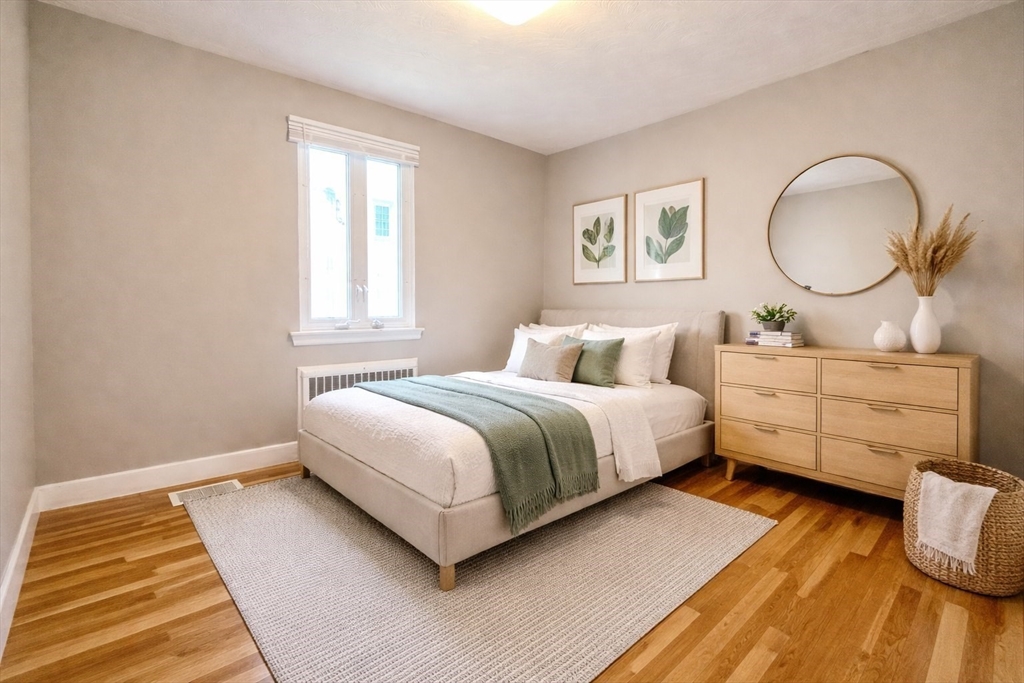 110 Craftsland Road, Unit 110 Newton, MA 02467 - Photo 7 of 14 a bedroom with a bed and window