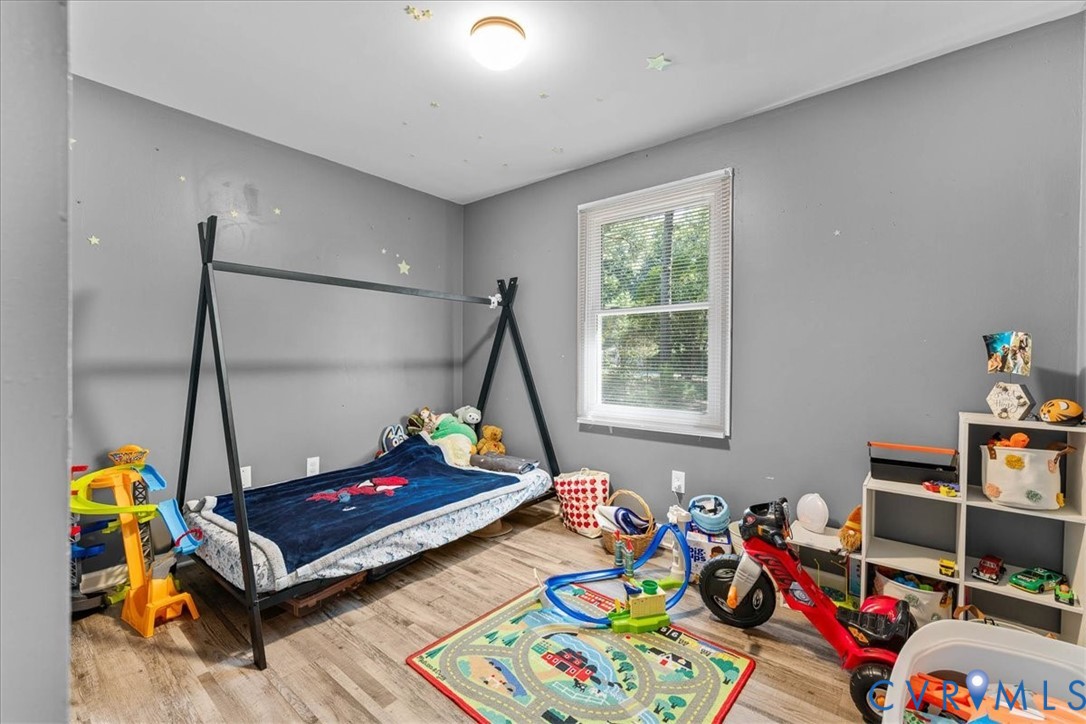 2224 Butler Branch Road Petersburg, VA 23805 - Photo 11 of 24 a bedroom with furniture and a window