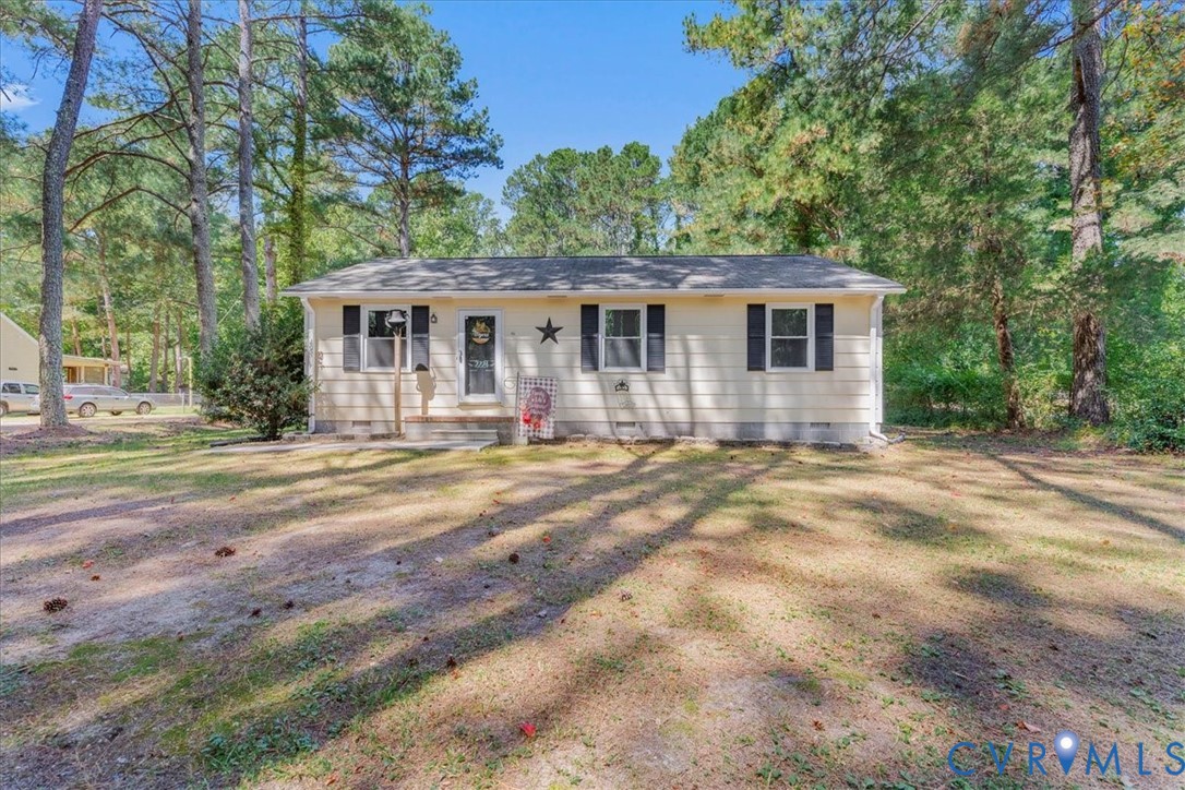 2224 Butler Branch Road Petersburg, VA 23805 - Photo 12 of 24 a front view of a house with a yard
