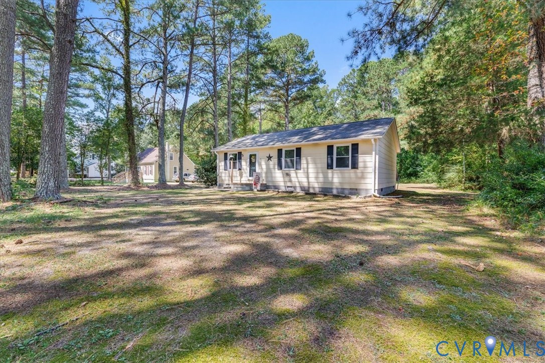 2224 Butler Branch Road Petersburg, VA 23805 - Photo 14 of 24 a front view of house with yard and green space