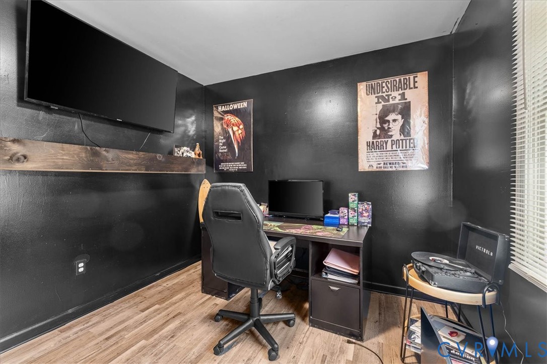 2224 Butler Branch Road Petersburg, VA 23805 - Photo 3 of 24 a workspace with furniture and wooden floor