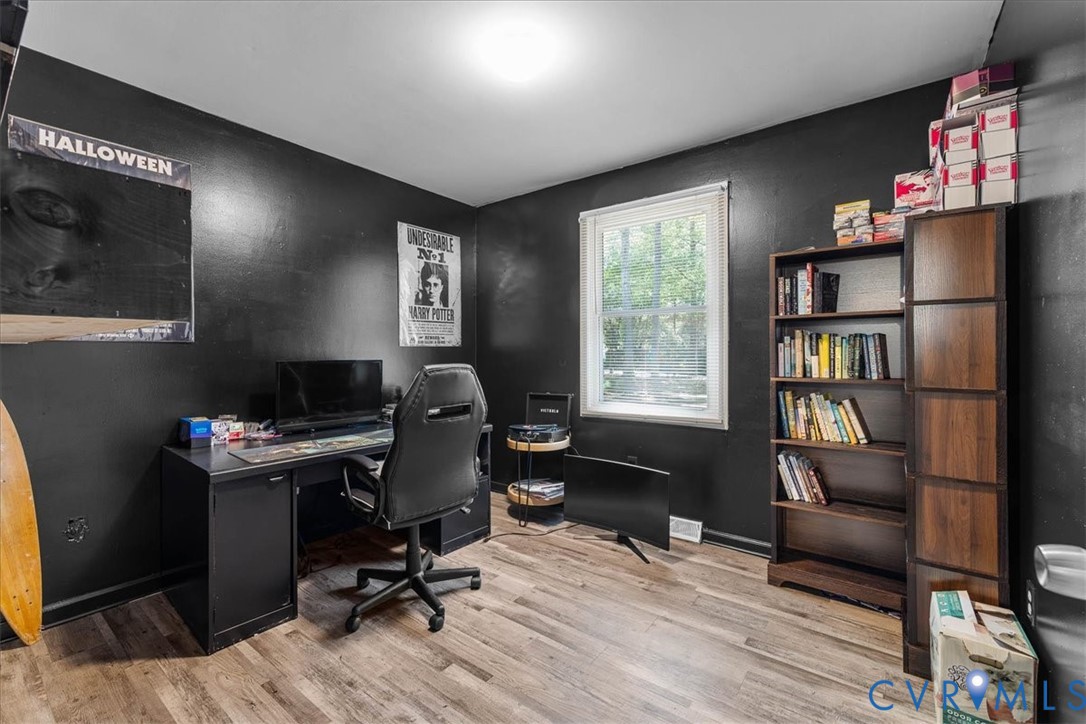 2224 Butler Branch Road Petersburg, VA 23805 - Photo 5 of 24 a view of a workspace with furniture and a window