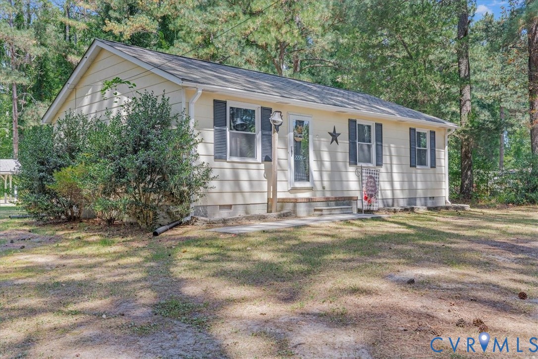 2224 Butler Branch Road Petersburg, VA 23805 - Photo 10 of 24 a front view of a house with a garden