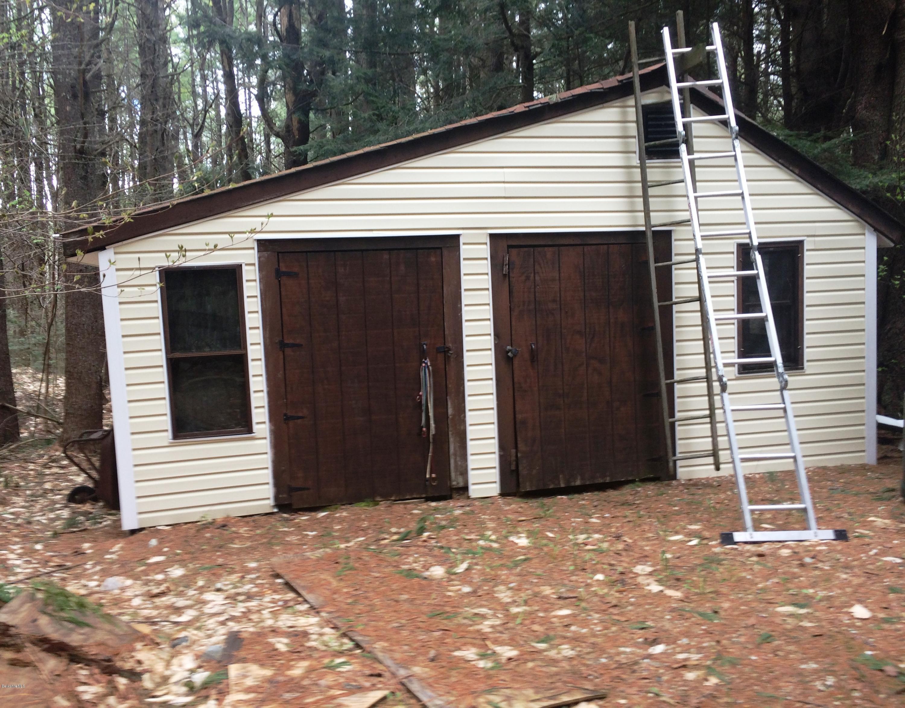 5-10 759 North Main Road Otis, MA 01253 - Photo 3 of 18 a view of a house with backyard