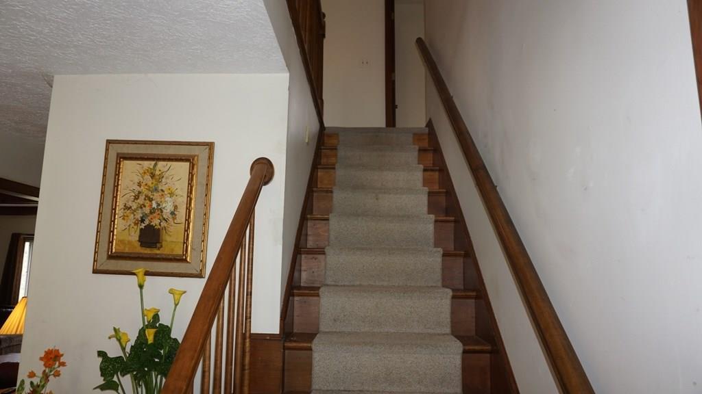 1457 Royalsborough Road Durham, ME 04222 - Photo 13 of 34 Looking up hardwood stairs from the...