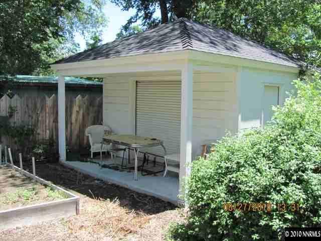 1260 Patrick Avenue Reno, NV 89509 - Photo 6 of 9 a backyard of a house with outdoor seating