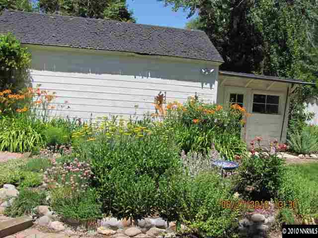 1260 Patrick Avenue Reno, NV 89509 - Photo 8 of 9 a aerial view of a house with a yard and potted plants