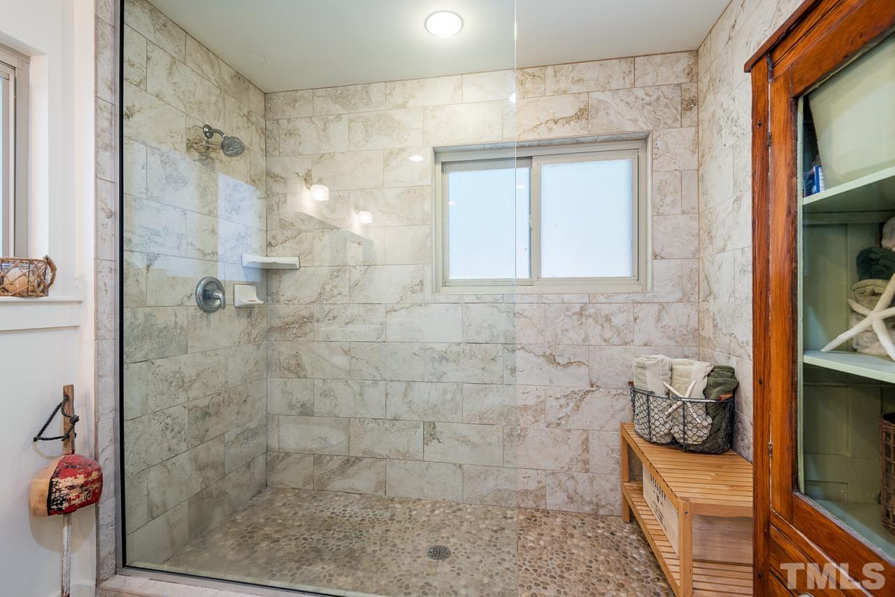 2639 Umstead Road Durham, NC 27712 - Photo 29 of 42 a bathroom with a shower