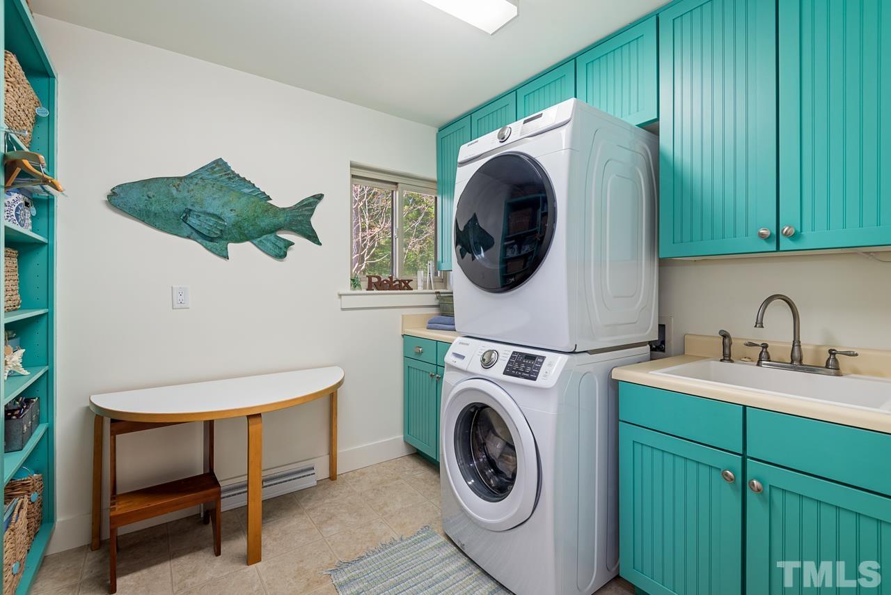 2639 Umstead Road Durham, NC 27712 - Photo 31 of 42 a utility room with dryer and washer
