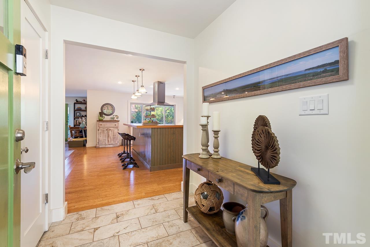 2639 Umstead Road Durham, NC 27712 - Photo 6 of 42 a view of living room with furniture and a fireplace