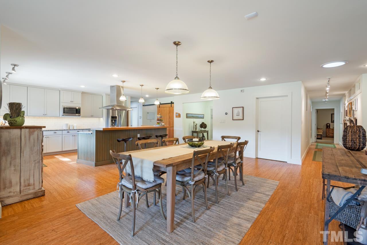 2639 Umstead Road Durham, NC 27712 - Photo 8 of 42 a view of a dining area with furniture