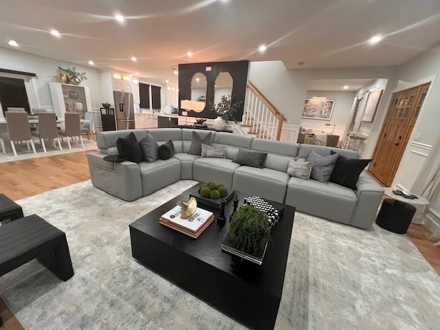 6 Rivendell Lane Millis, MA 02054 - Photo 16 of 33 a living room with furniture and a flat screen tv