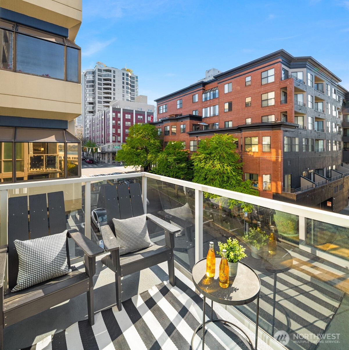 76 Cedar Street, Unit 609 Seattle, WA 98121 - Photo 16 of 31 a front view of a building with sitting area