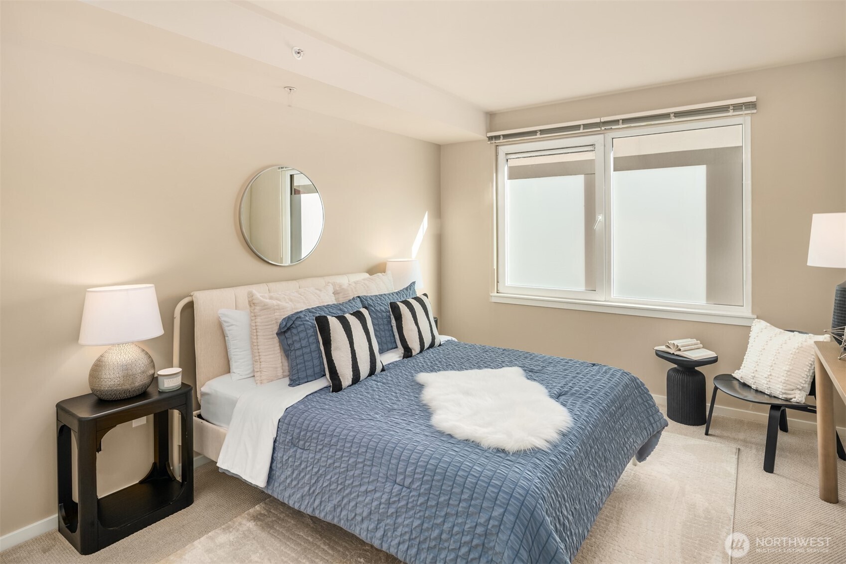 76 Cedar Street, Unit 609 Seattle, WA 98121 - Photo 17 of 31 a bedroom with bed and a window