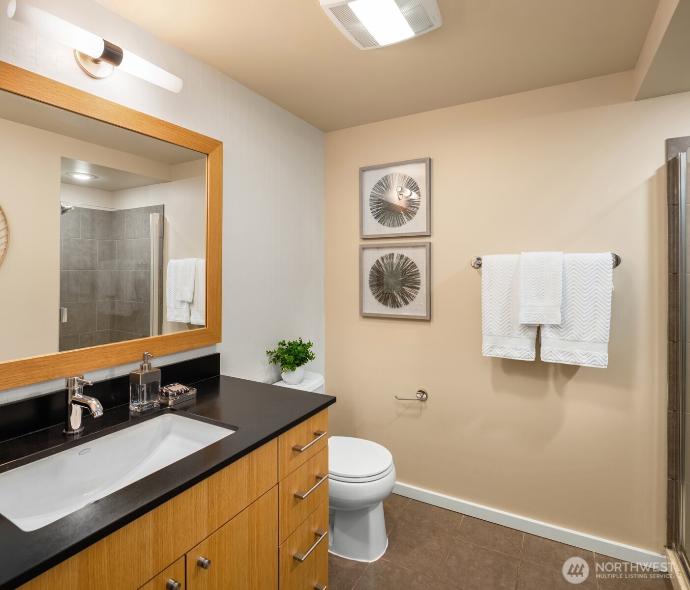76 Cedar Street, Unit 609 Seattle, WA 98121 - Photo 20 of 31 a bathroom with a sink and a mirror