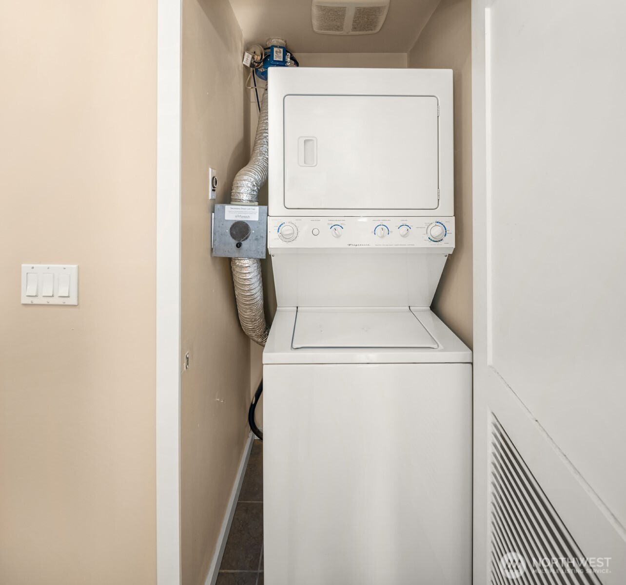 76 Cedar Street, Unit 609 Seattle, WA 98121 - Photo 21 of 31 a utility room with dryer and washer