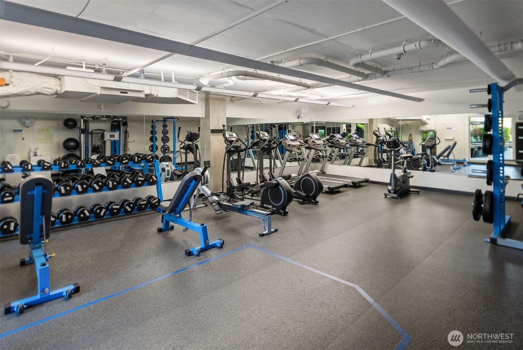 76 Cedar Street, Unit 609 Seattle, WA 98121 - Photo 24 of 31 a view of a room with gym equipment